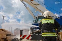 Новости » Общество: Спасатели тренировались тушить пожар на стройке Керченского моста