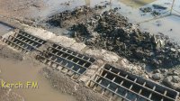 Новости » Коммуналка: Коммунальщики Керчи очистили ливневку на Щорса, но не убрали мусор