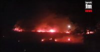 В Керчи за огородами частного сектора горела трава (видео)