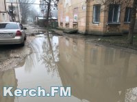 Новости » Общество: В одном из переулков в Аршинцево невозможно пройти из-за огромных луж