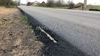 На Аршинцевской косе укладывают второй слой асфальта