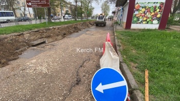 Новости » Общество: На дублере ул. Генерала Петрова приступили к ремонту дороги