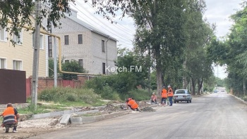 Новости » Общество: Дорогу по улице Комарова заасфальтировали